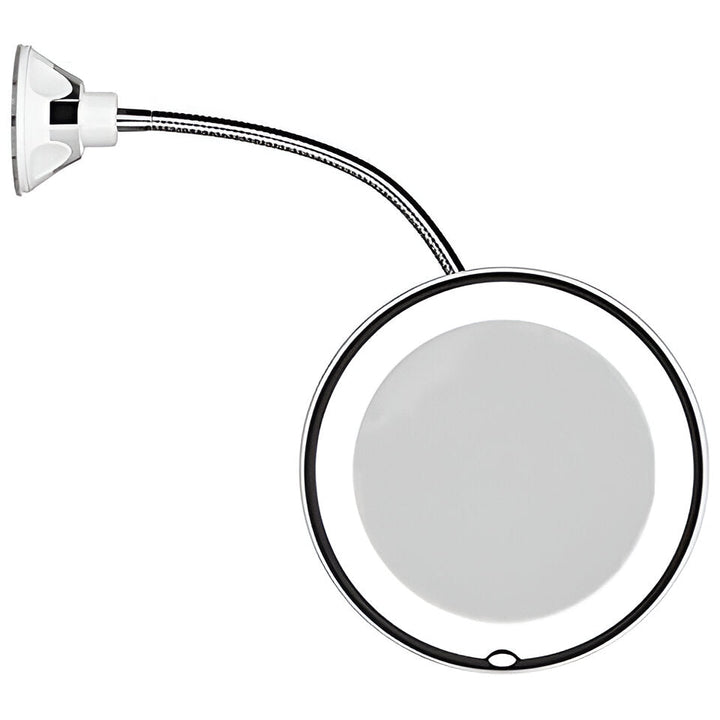 Portable LED makeup mirror with 10X magnification and strong suction cup, ideal for travel and precise grooming.