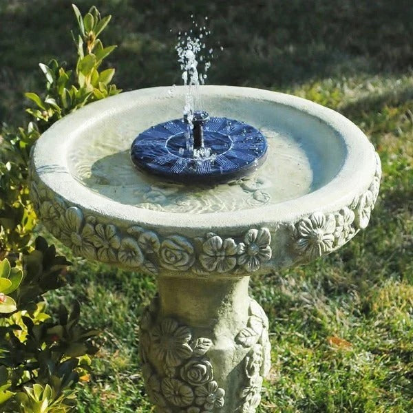 Floating solar pond fountain pump for birdbaths & gardens. Eco-friendly, solar-powered outdoor water feature.
