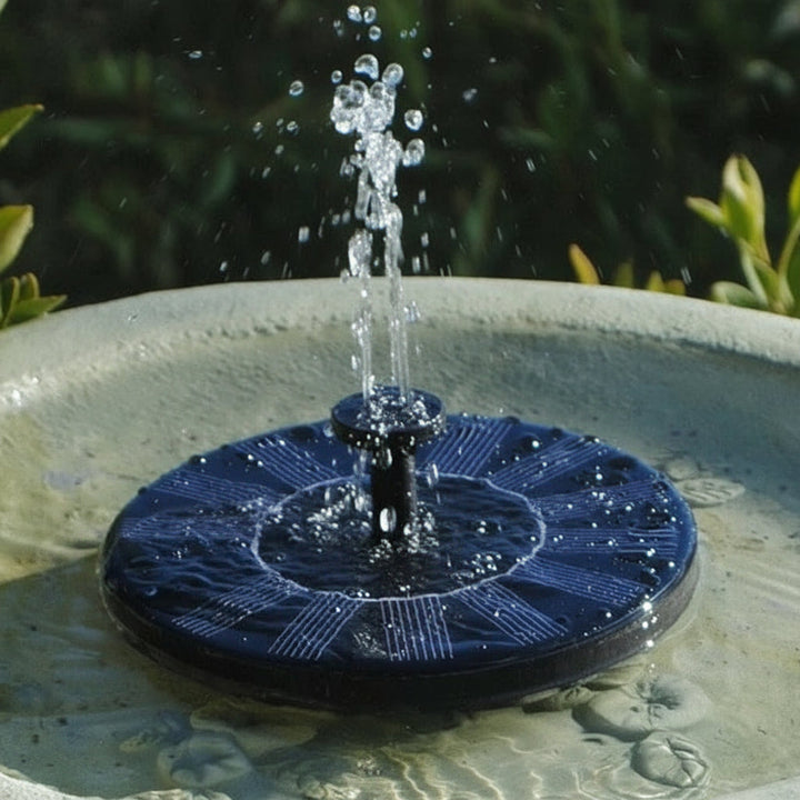 Eco-friendly floating solar fountain pump with customizable spray for ponds & birdbaths. No electricity required.
