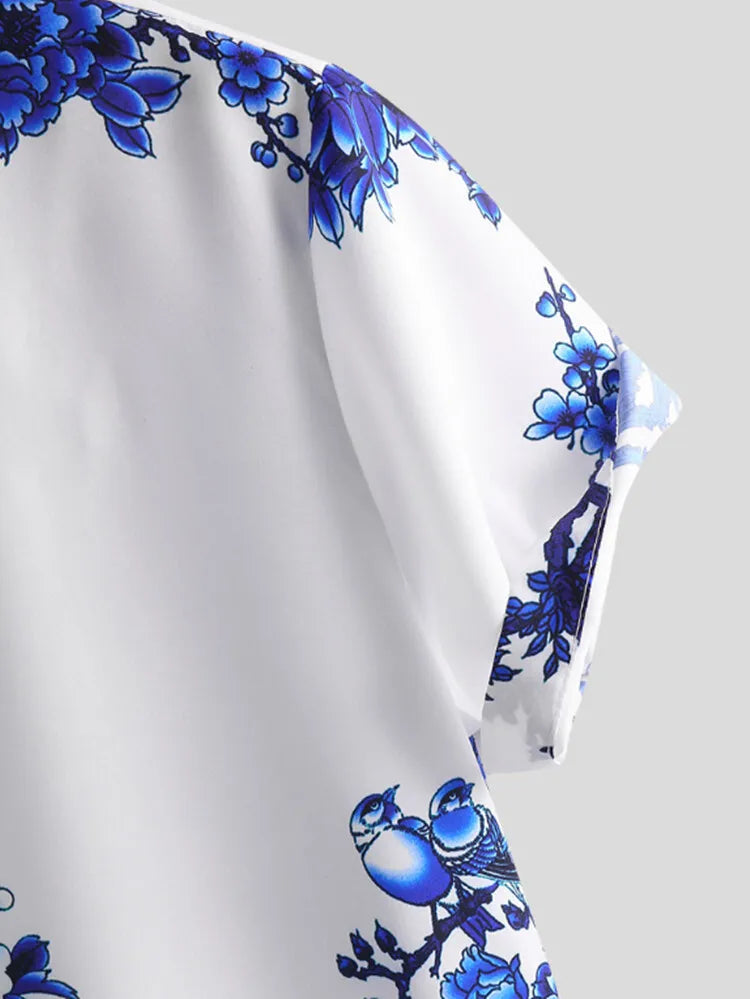 Vibrant floral men's shirt, short sleeve & breathable, essential for summer beachwear.
