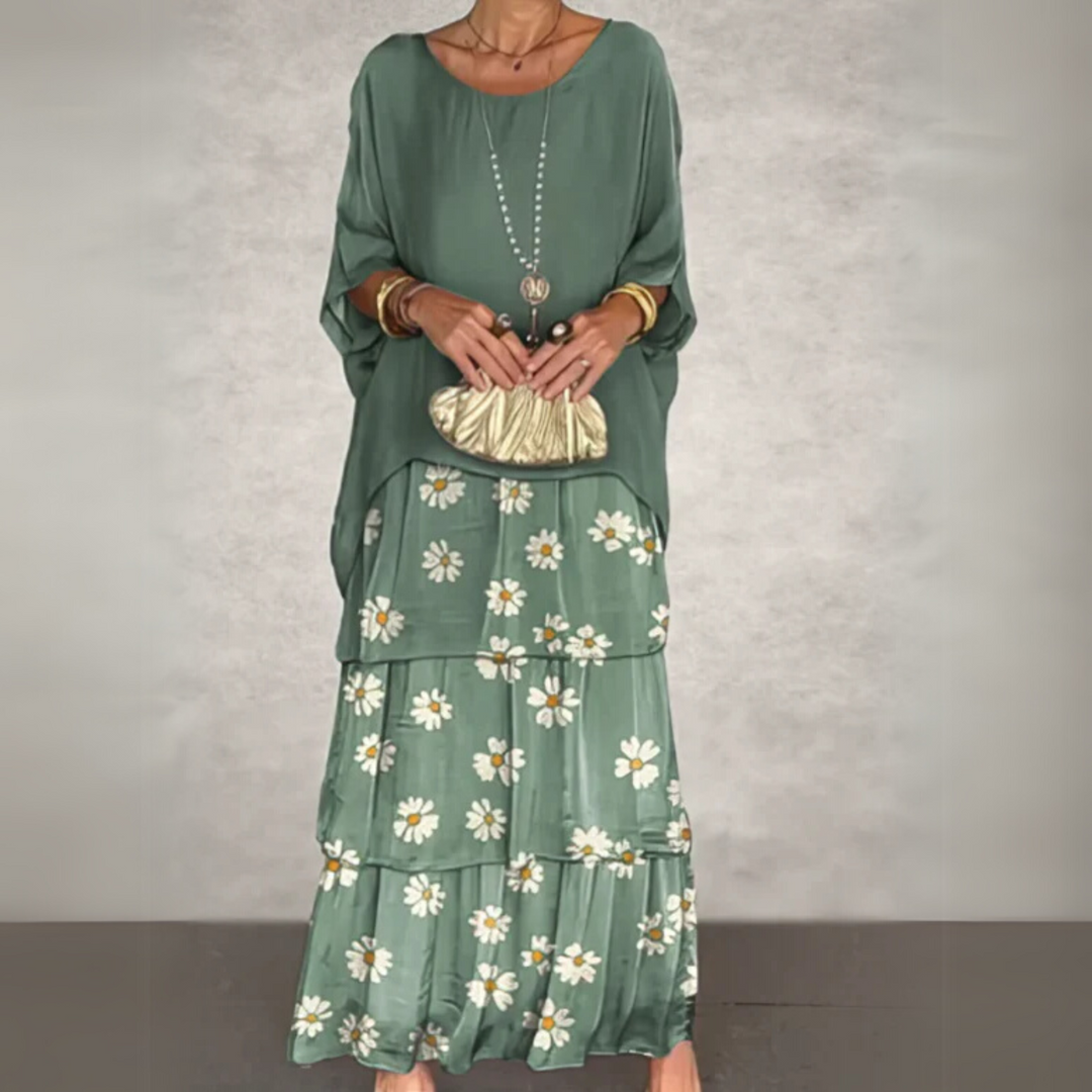 Printed long sleeve tiered maxi dress for women, offering a flowy, relaxed fit ideal for everyday fashion.