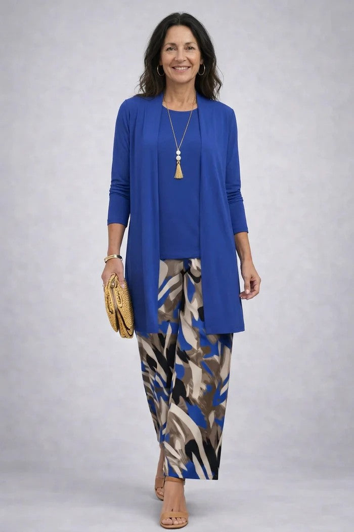 Chic women's coordinated 3-piece outfit with relaxed fit blazer, top, and matching trousers.