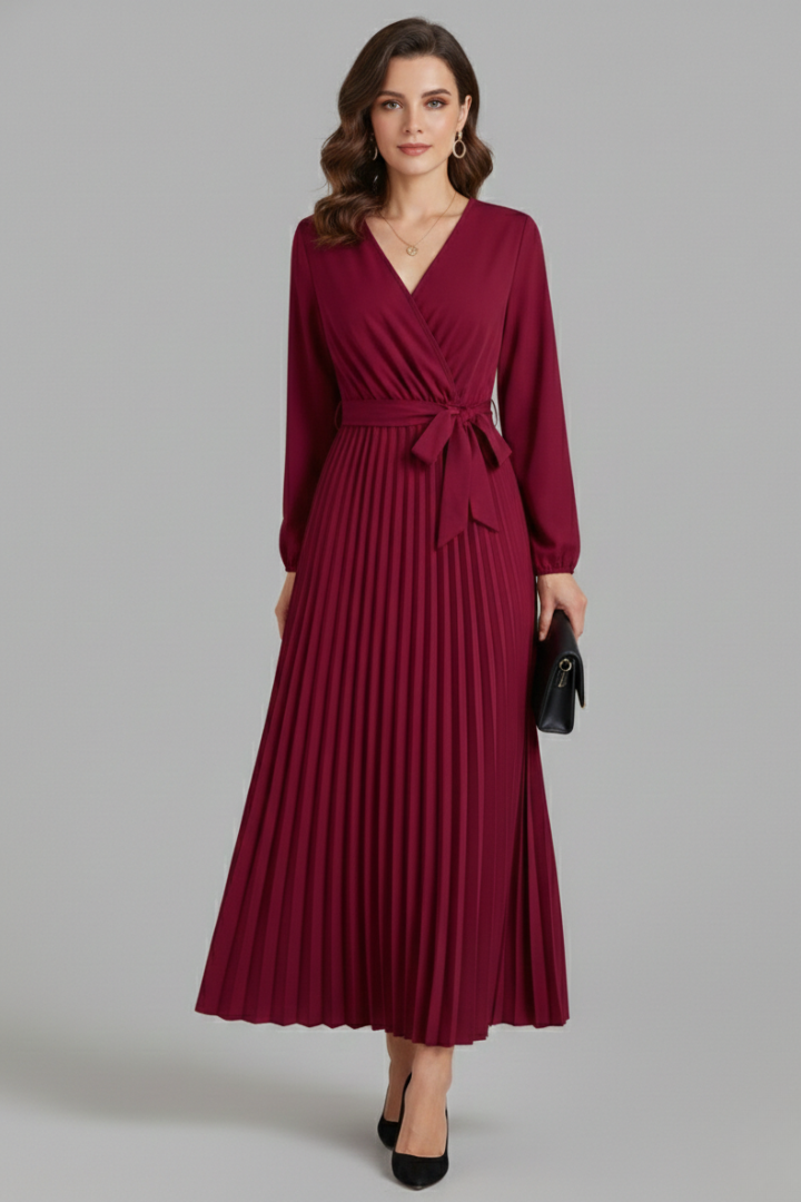 Stylish women's long sleeve V-neck maxi dress featuring a beautiful pleated skirt & a flattering tie waist.