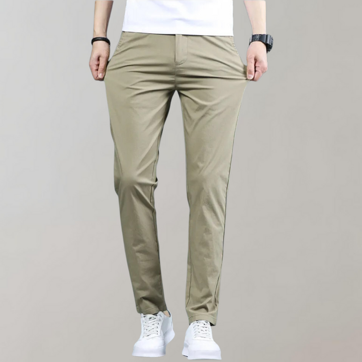 Full shot of men's slim-fit comfortable casual pants in a versatile charcoal gray color for everyday wear.