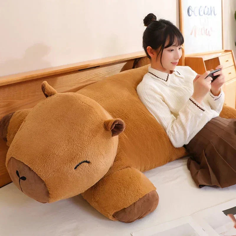 Giant Capybara Plushie: soft, cuddly snuggle buddy for comfort & stress relief. Perfect kids/adults gift.
