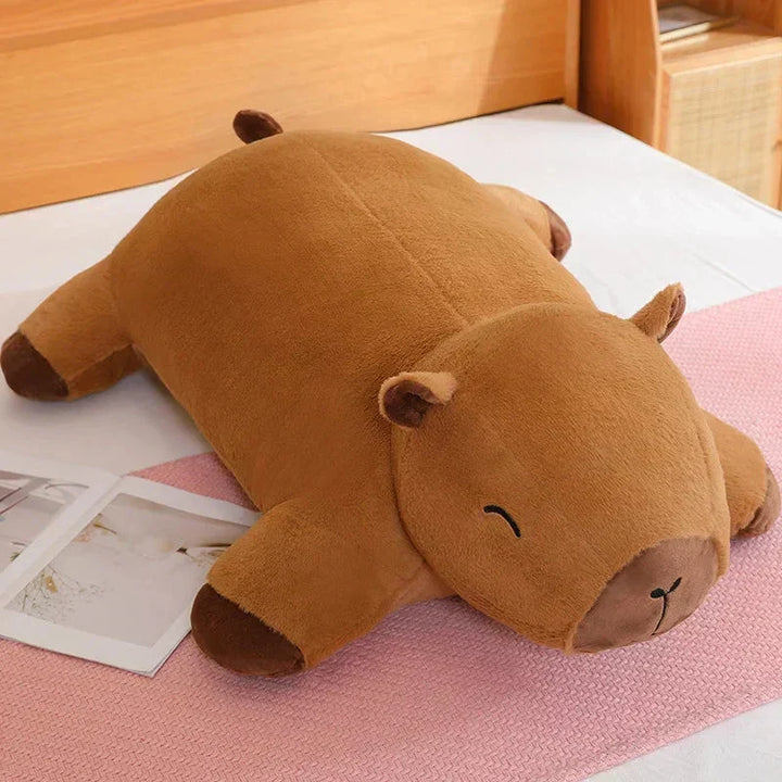 Huge capybara plushie: soft, comforting animal toy & stress relief item. Great for adults/kids.