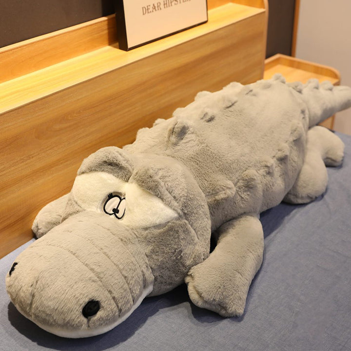 Machine washable giant crocodile plush, a soft & hypoallergenic snuggle buddy. Perfect animal plush gift.