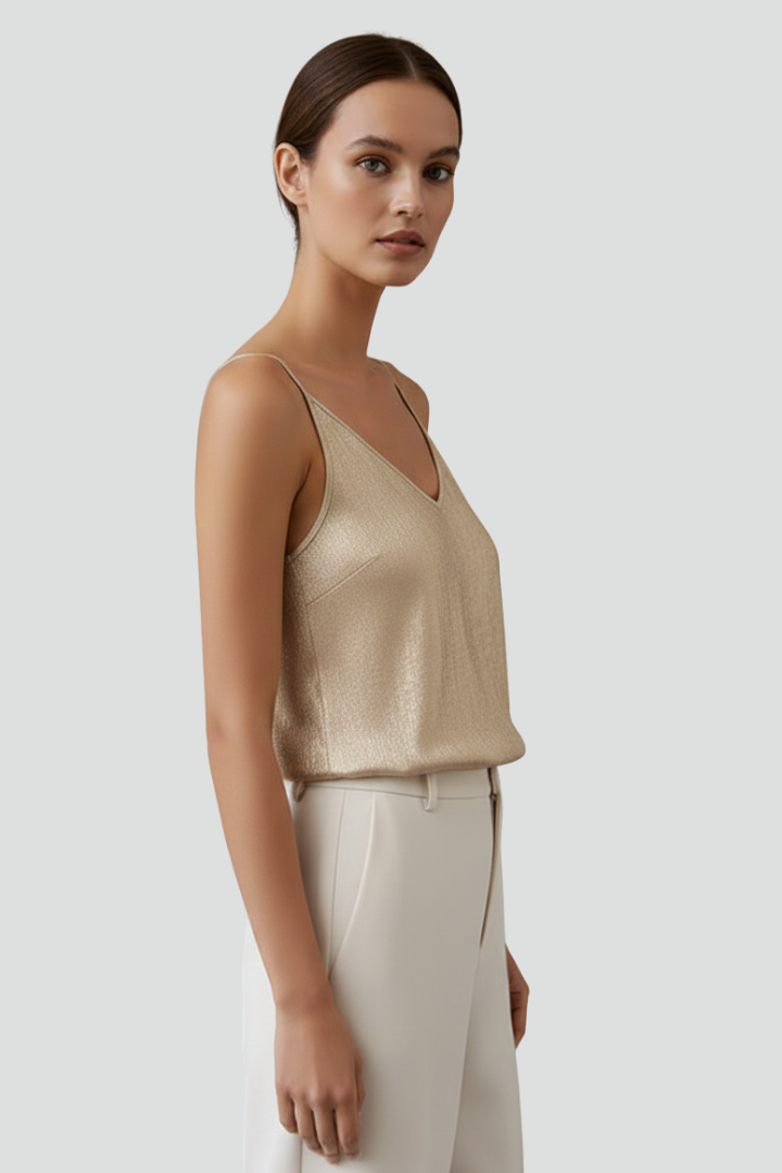 Soft gold V-neck cami for women, featuring thin spaghetti straps and a comfortable relaxed fit for summer.