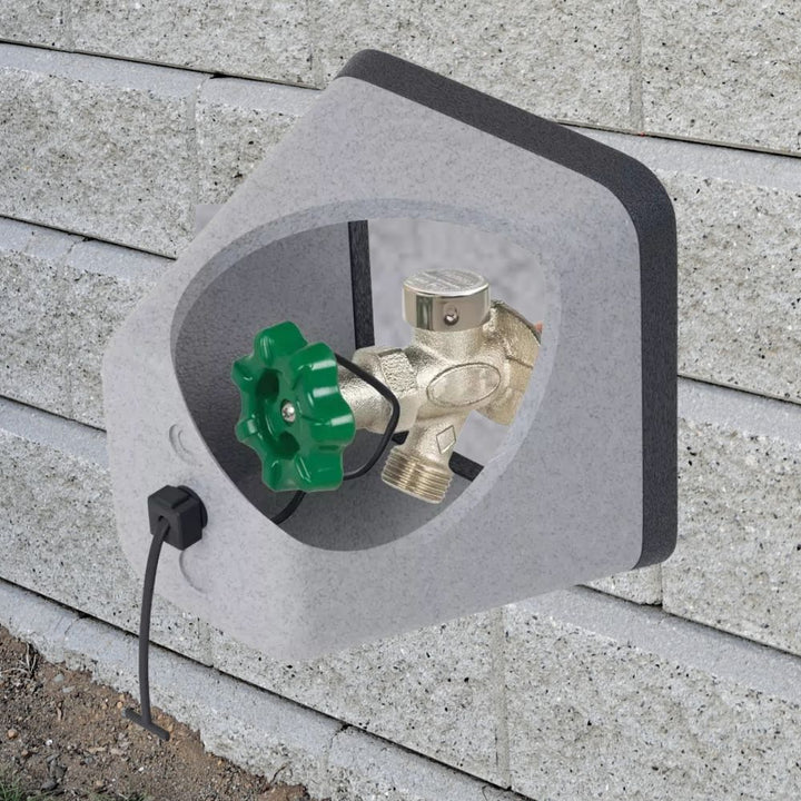 "Gray polystyrene outdoor spigot protector with Velcro strap, providing winter insulation cover for faucets against freeze da