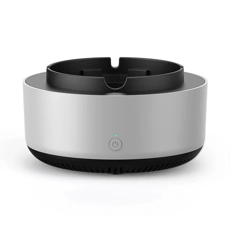 "Gray portable smokeless ashtray with air purifier for home and car use, featuring a sleek design and cigarette slots."