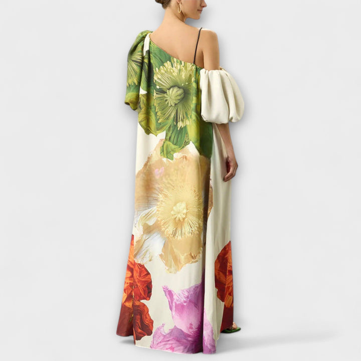 Elegant green floral maxi dress for women, ideal for occasion wear with an asymmetrical neckline.