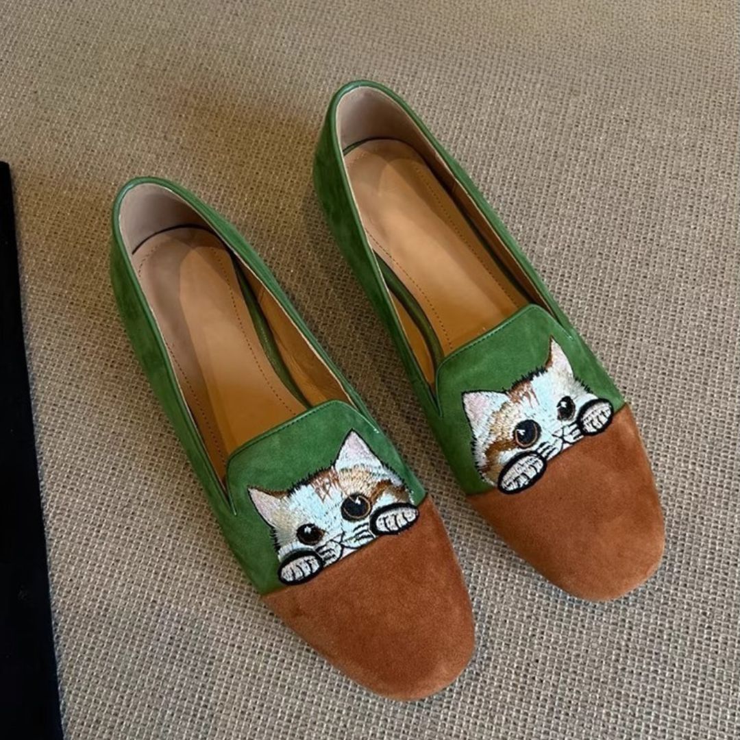 Stylish women's tan suede loafers featuring a unique embroidered cat design, casual flat shoes