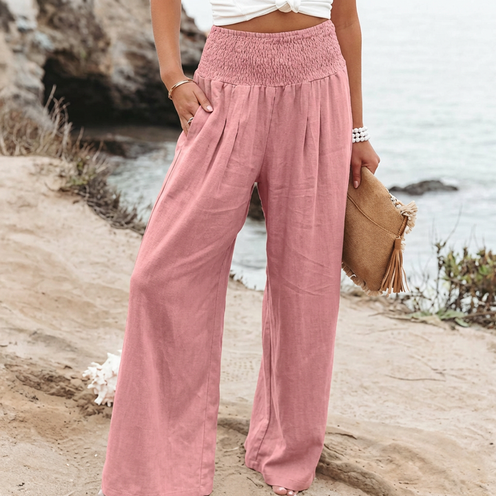 Breezy wide-leg high-waist palazzo pants for women, flowy and comfortable for summer fashion.