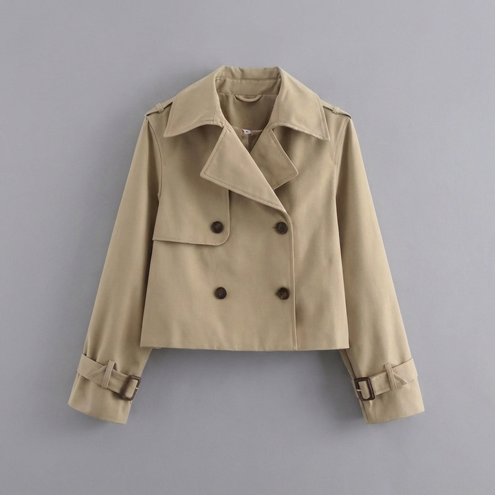 Stylish women's cropped trench coat with double buttons & lapels. Versatile spring/fall outerwear, light layer.