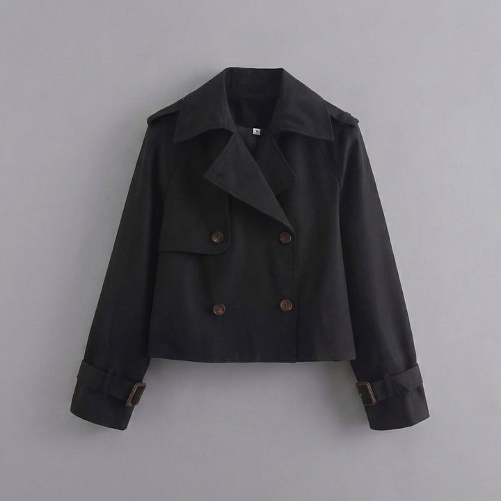 Elegant women's cropped trench coat. Features double-button closure & classic lapel. Ideal spring/fall fashion.