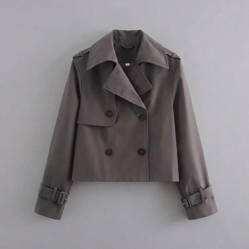 Fashionable women's cropped trench coat with double buttons. Chic spring & fall outerwear for a stylish light layer.