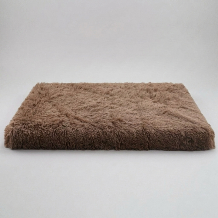 Comfortable anti-anxiety dog bed for pets, featuring memory foam, a removable cover, and non-slip bottom for stability.