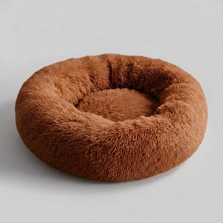 Comfortable plush faux fur dog bed, machine washable, designed for pet anxiety relief and deep sleep.