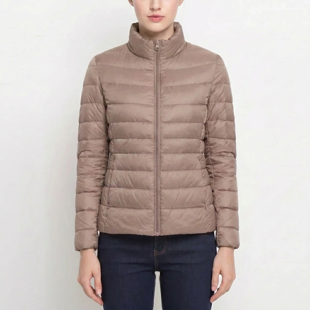 Chic women's puffer jacket, quilted for a slim fit. A warm layering piece for autumn & winter style.