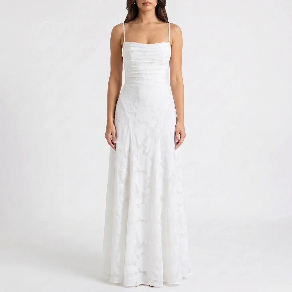 Chic women's floral print maxi evening dress with spaghetti straps, suitable for elegant party wear.