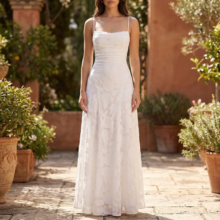 Women's elegant floral maxi evening dress with spaghetti straps, perfect for formal events & wedding guests.