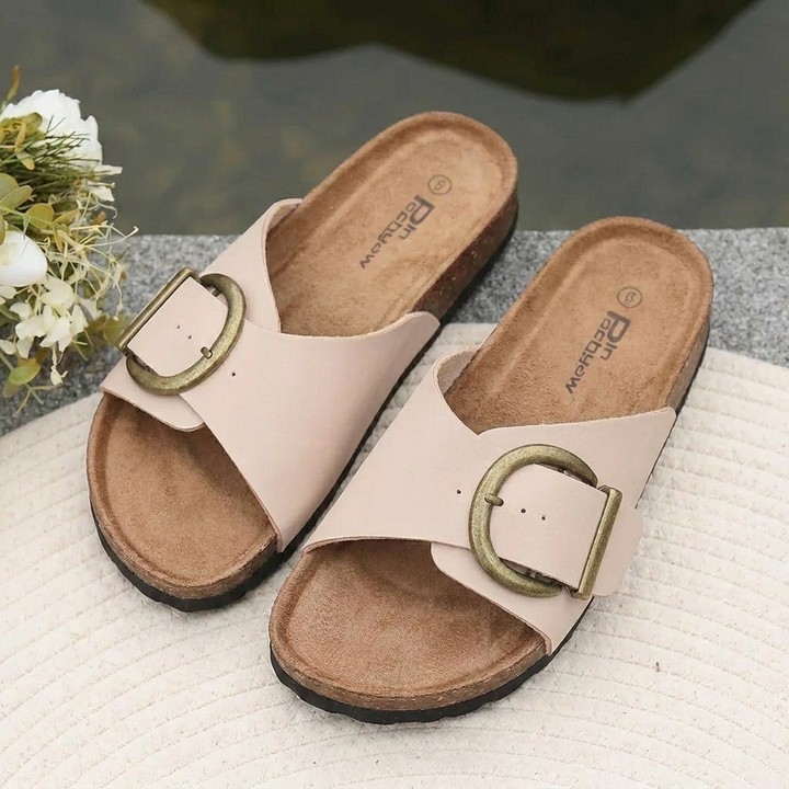 Chic women's open-toe slides featuring a prominent bold buckle, comfortable and casual summer footwear.