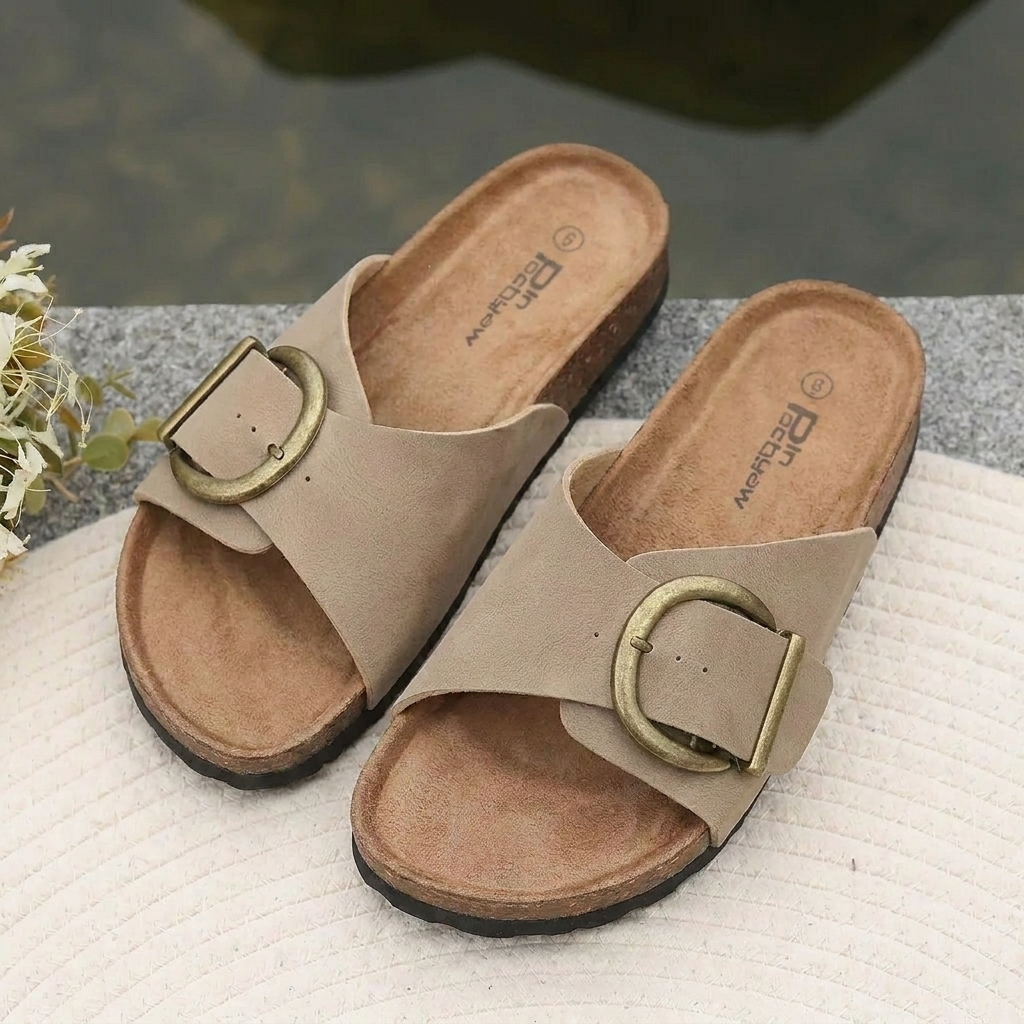 Women's casual open-toe slide sandals with a stylish bold buckle, great for summer and warm weather outfits.
