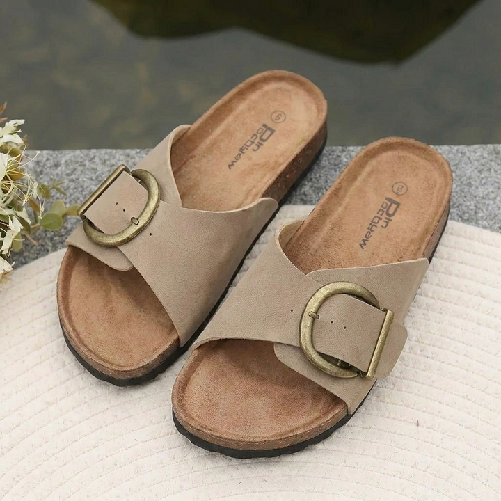Women's casual open-toe slide sandals with a stylish bold buckle, great for summer and warm weather outfits.