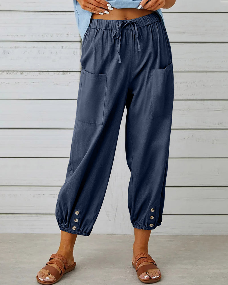 Elegant women's high-waisted wide-leg trousers, perfect for office wear or casual spring outfits. Comfortable & stylish.