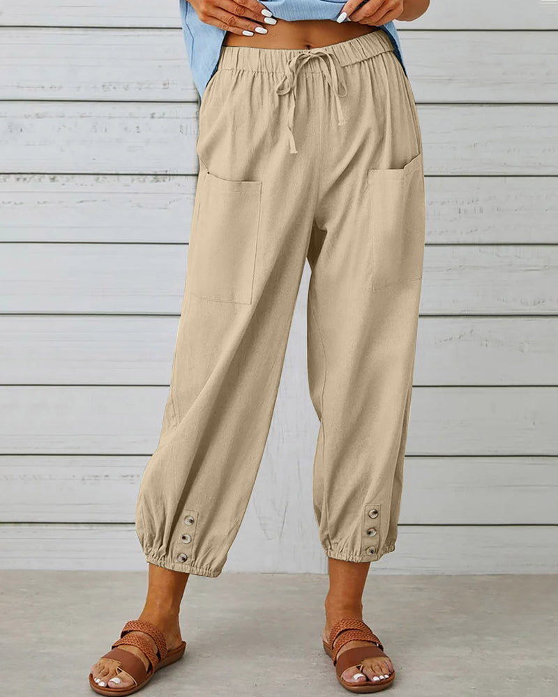 Chic ladies high-waisted wide-leg trousers. These versatile pants offer an elegant, relaxed fit for any occasion.