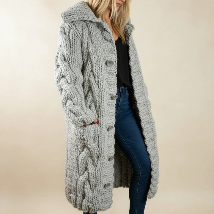 Chic women's hooded long cardigan for casual chic style. Comfortable knit, perfect layering piece for everyday.