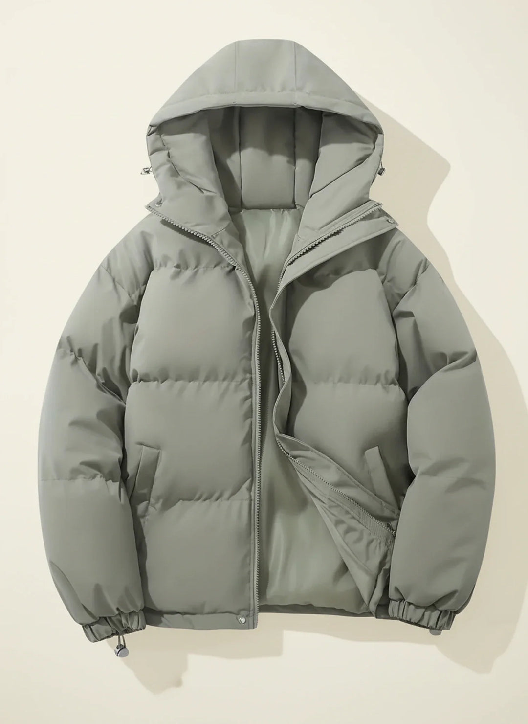Durable women's hooded puffer winter jacket, ideal for cold weather. Warm, protective outerwear essential.