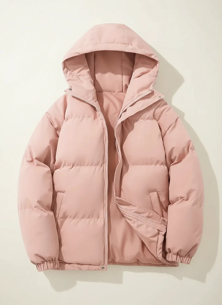 Cozy women's hooded puffer jacket, a warm winter essential. Comfortable outerwear for cold weather protection.
