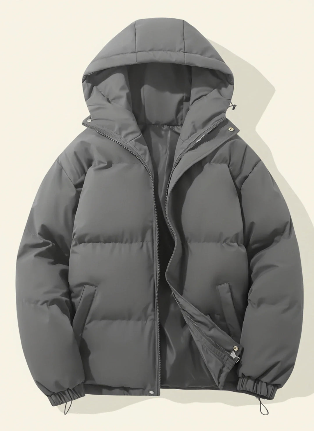 Essential women's hooded puffer winter jacket. Stay warm and stylish in cold weather with this cozy outerwear.