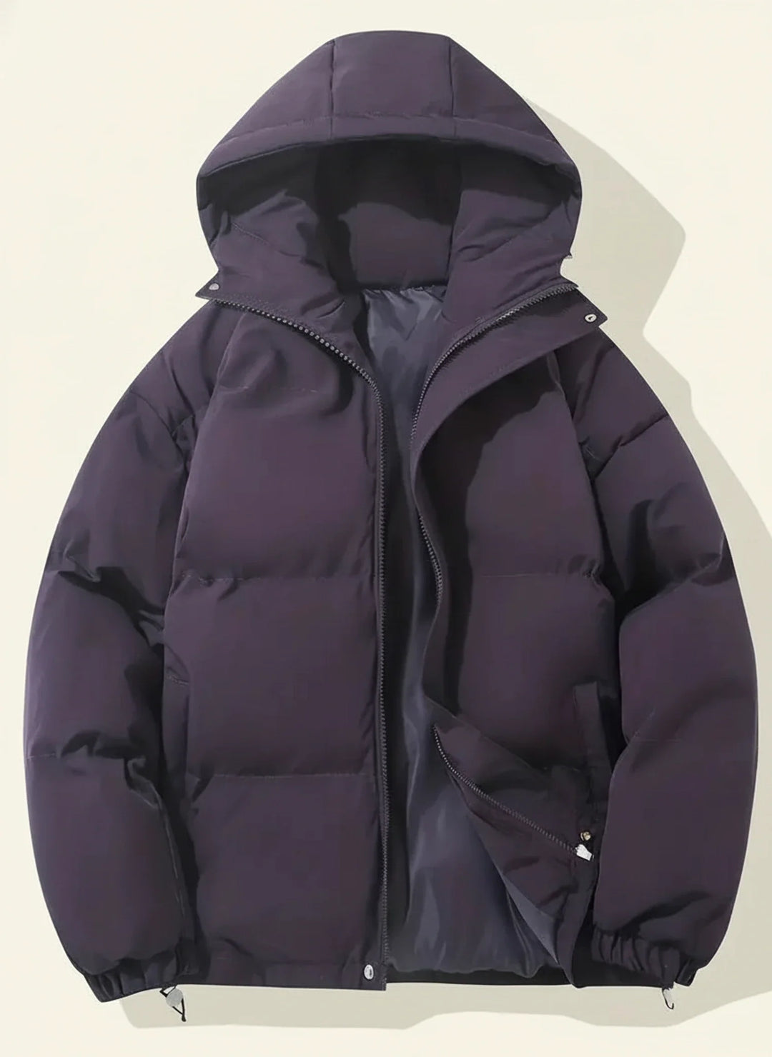 Stylish women's hooded puffer winter jacket with quilted design. Warm outerwear for cold weather fashion.