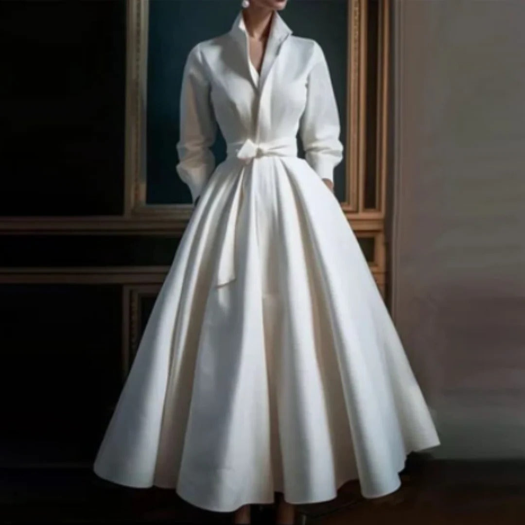 Elegant white women's long sleeve V-neck A-line midi dress. Versatile for daytime or evening sophistication.