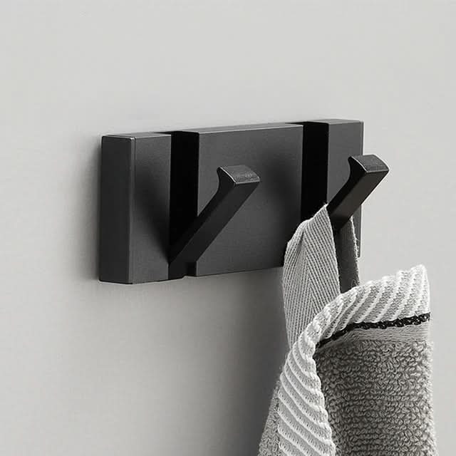 Easy-install folding wall hook for smart organization in entryways & small spaces.