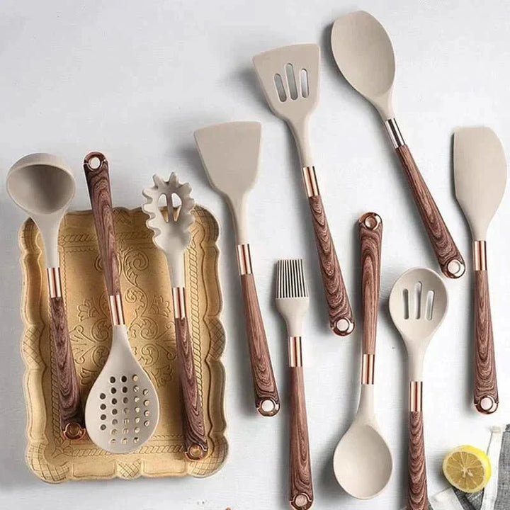 Heat-resistant silicone kitchen tools with ergonomic wood handles, safe for nonstick pots and pans. Complete cooking set.