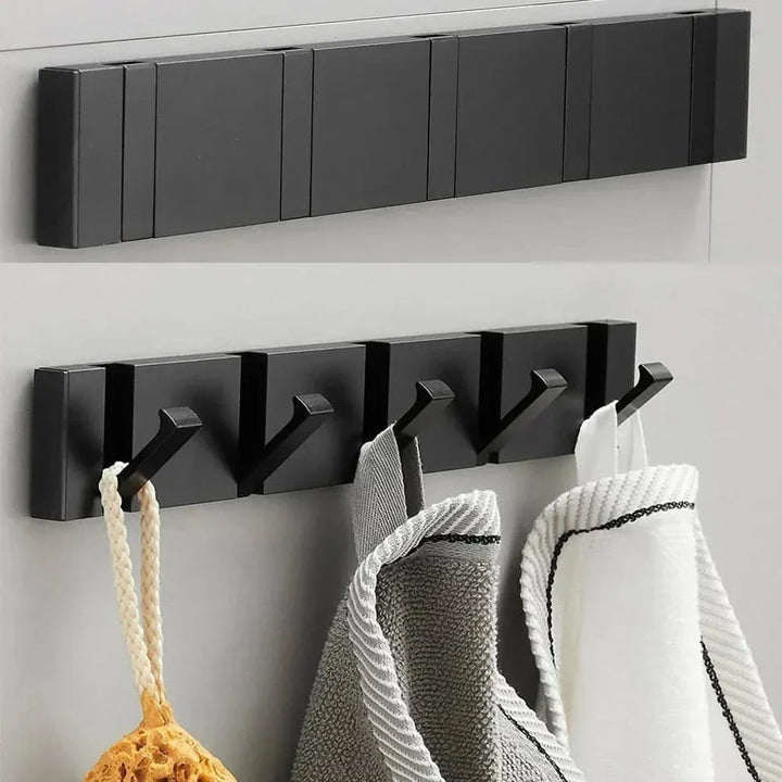 Versatile folding wall hook for coats, towels & bags; smart home organization.
