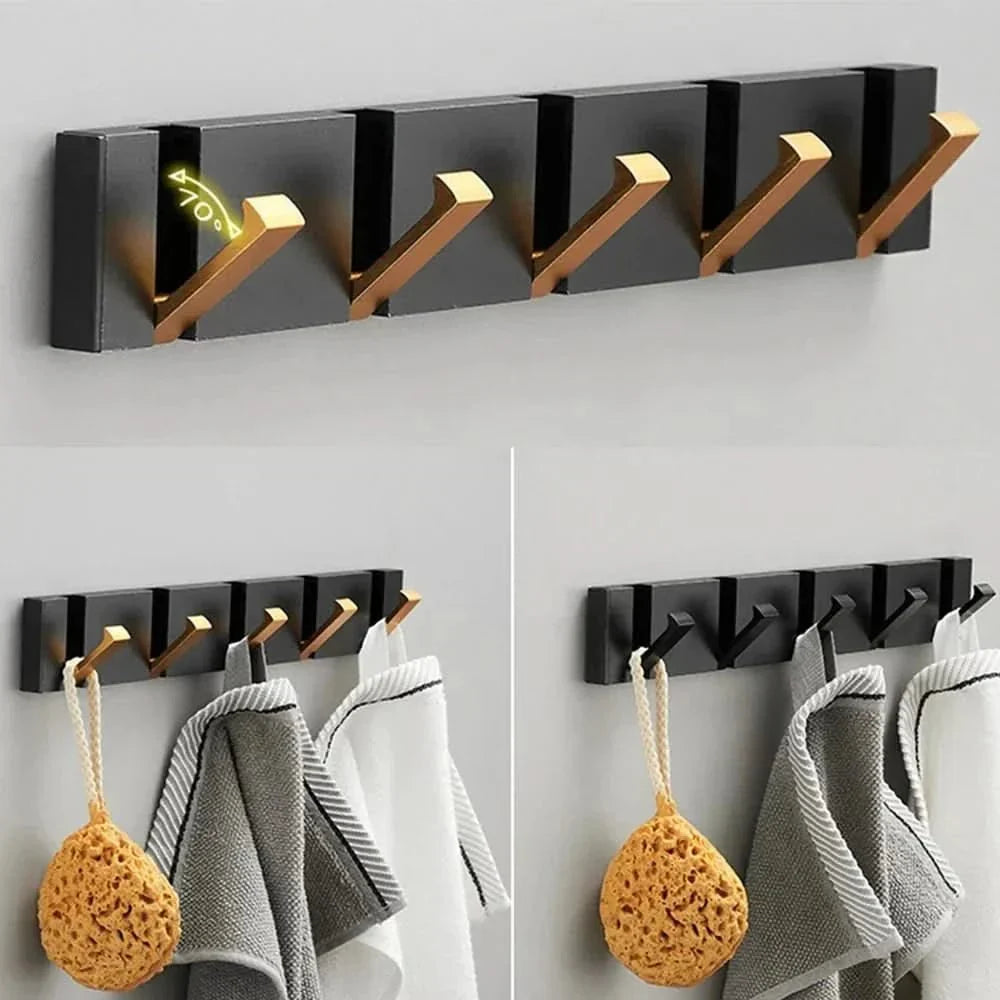 Sleek, modern folding wall hook in aluminum; a minimalist storage solution.