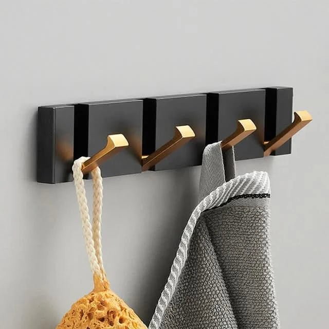 Space-saving folding wall hook for coats, towels, hats & accessories.