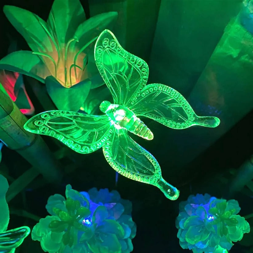 Bright LED solar garden figurine lights, waterproof and decorative for outdoor pathways.
