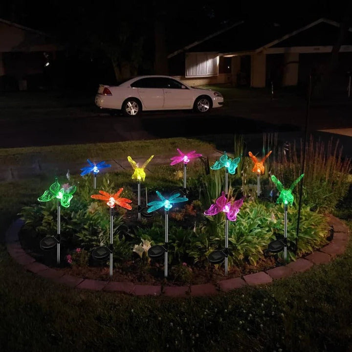 Waterproof solar LED figurine lights, energy-efficient for charming outdoor garden and pathway decor.