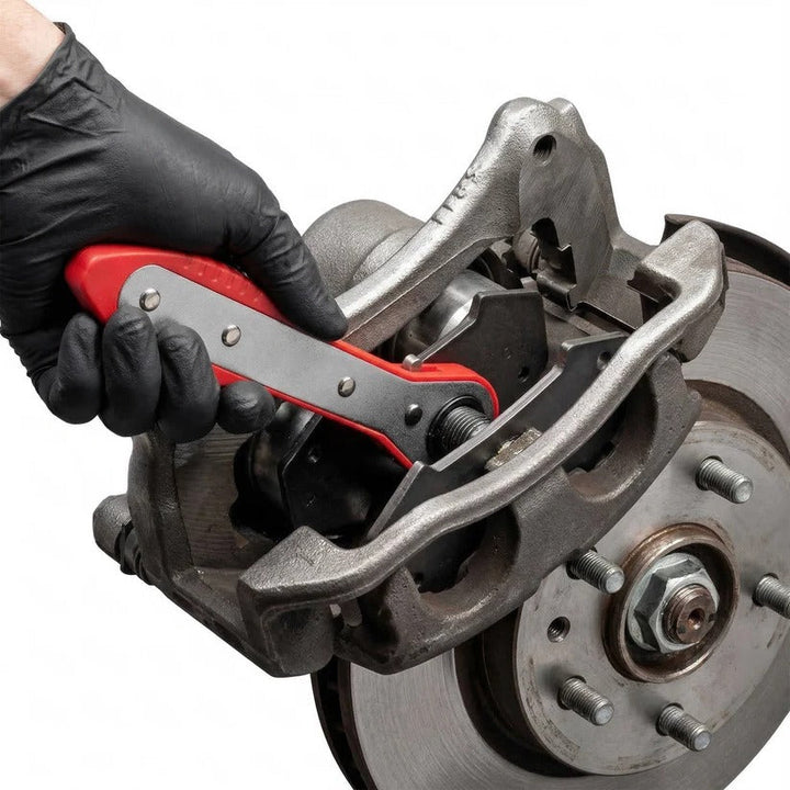 Automotive ratchet tool for compressing brake caliper pistons during quick and easy disc brake service.