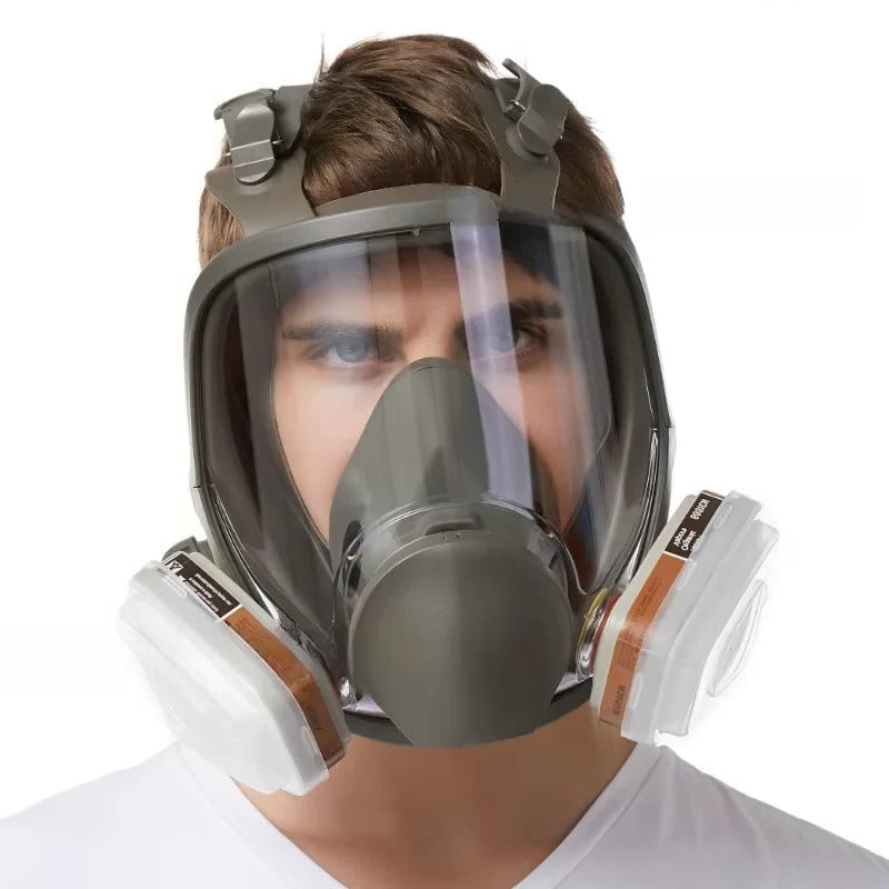 Full face respirator mask showing clear anti-fog lens, durable straps, and a soft silicone face seal for PPE.