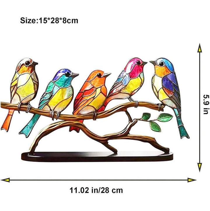 Intricate stained glass bird tabletop decor. Handcrafted colorful glass suncatcher, perfect shelf accent.