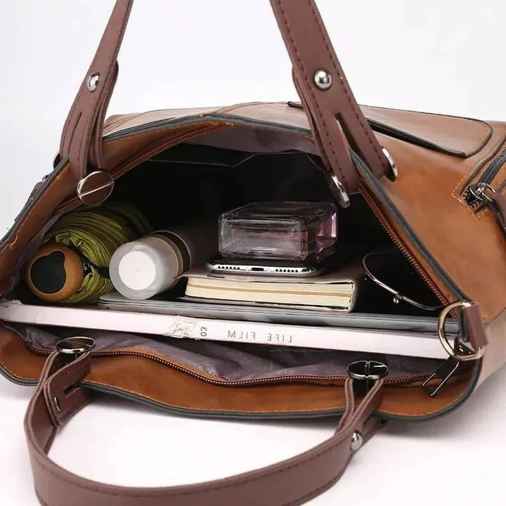 Chic ladies' leather handbag, elegant and timeless, perfect minimalist accessory for work, travel, or everyday.