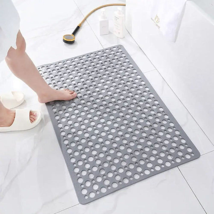 Washable anti-slip shower mat, perfect for bathroom safety. Durable, hygienic, and modern non-slip floor mat with suction.
