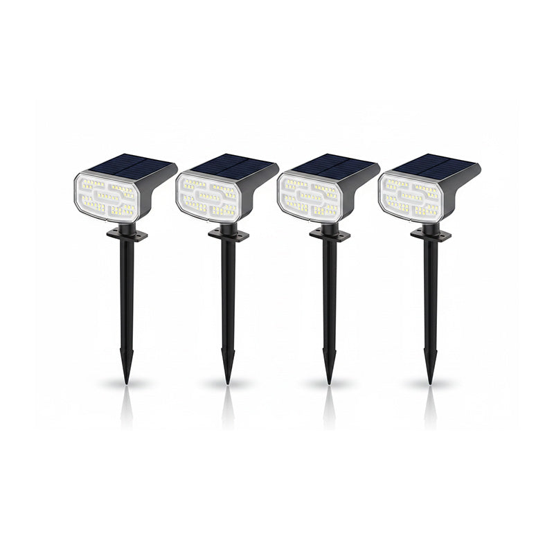 4-pack outdoor solar spotlights with auto sensor & dual brightness for garden & landscape lighting.
