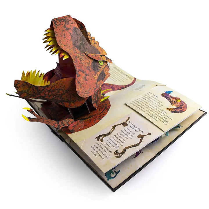 Close-up of an intricate 3D triceratops pop-up in an educational prehistoric dinosaur book for toddlers.